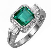 Zlatý prsteň sa smaragdom obklopeným diamantmi Cliantha
