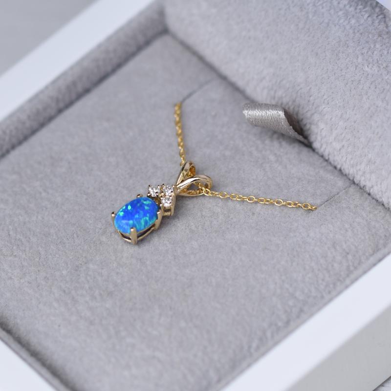 Zlatý prívesok s opálom a diamantmi 47790