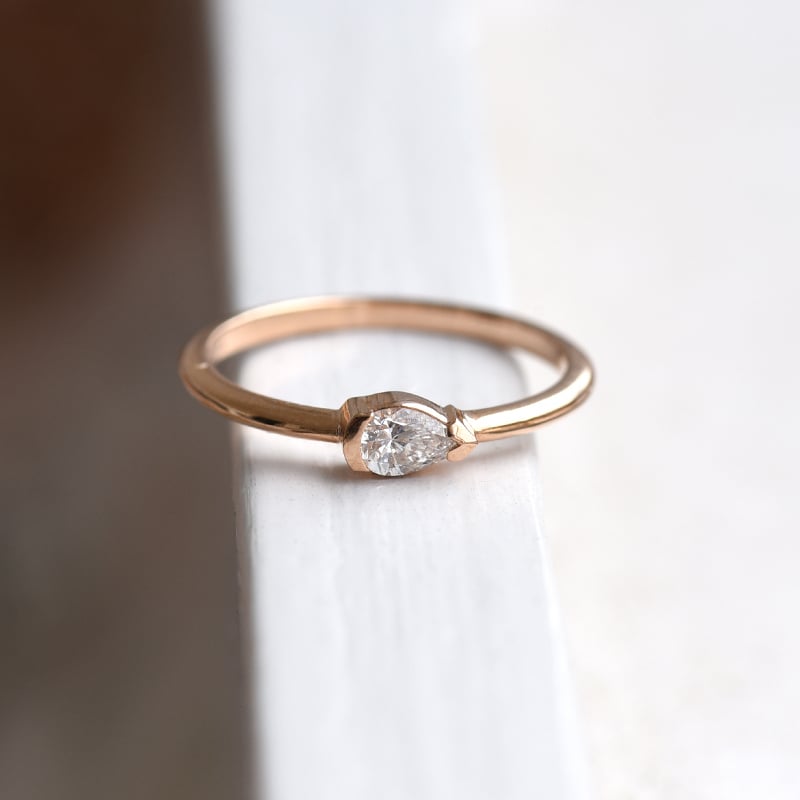 Zlatý prsteň s pear 0.19ct IGI certifikovaným diamantom 100285