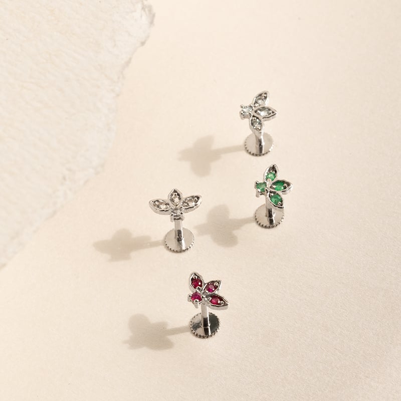 Zlatá piercing náušnica s nebesky modrými topásmi Ciera 138288