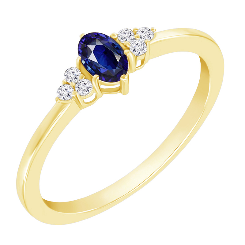 Zlatý prsteň s diamantmi a modrým zafírom
