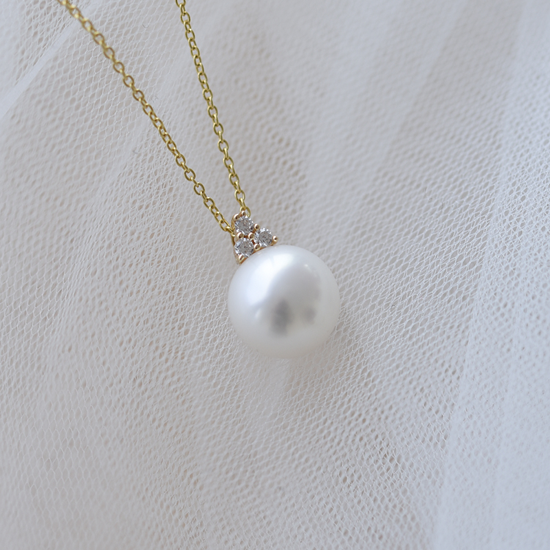 Zlatý prívesok s perlou a zirkónmi 61502
