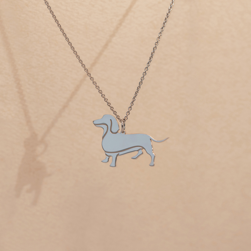 Strieborný prívesok v tvare psa s gravírom Dachshund 98595