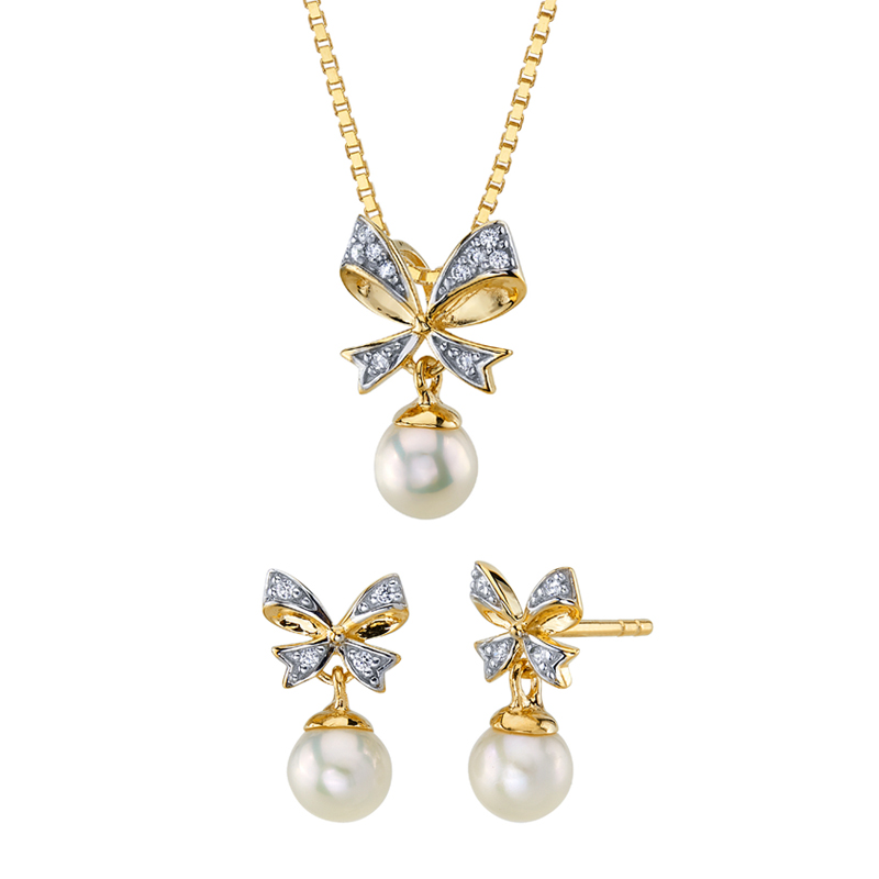 Kolekcia perlových šperkov so zlatými mašľami a zirkónmi