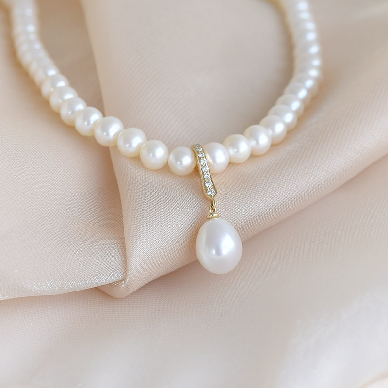 Zlatý perlový náhrdelník s diamantmi 93508