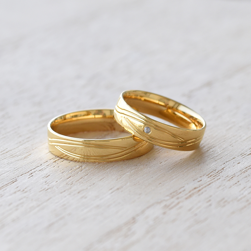 Zlaté svadobné prstene s diamantom 61459